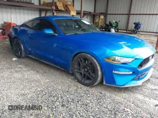 ✅ 2021 Ford Mustang GT • VIN: 1FA6P8CF4M5125666 • Lot: 42192986. Listed on IAAI with 63,667 mi. Free auction sales archive from the USA and detailed vehicle history report at DreamBid. Image 1.