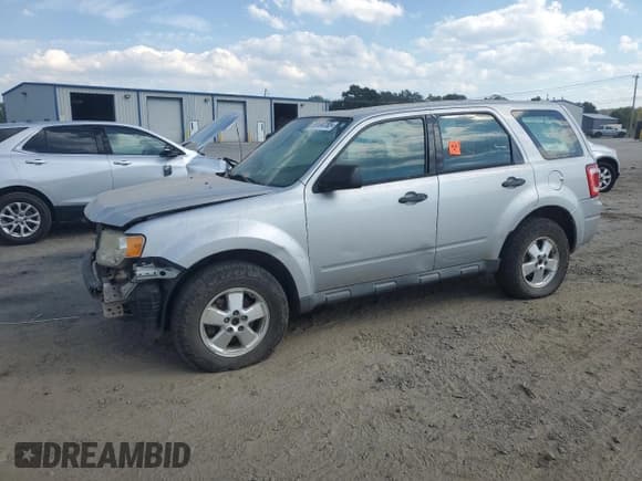 ✅ 2012 Ford Escape XLS • VIN: 1FMCU0C75CKA35597 • Lot: 86604185. Listed on Copart with 267,192 mi. Free auction sales archive from the USA and detailed vehicle history report at DreamBid. Image 1.