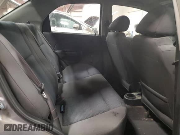 2006 Chevrolet Aveo LS z VIN KL1TD56646B553734, wystawiony jako Copart lot #88496205 z przebiegiem 156 610 mil mil oraz Czysty tytuł • Clean title. Historia ofert i sprzedaży dostępna na DreamBid. Obrazek 10.