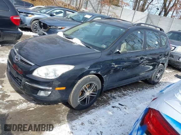 2010 Hyundai Elantra GLS with VIN KMHDC8AE7AU052667, listed as a IAAI auction lot 41586733 with 154,545 mi miles and . Bid and sale history available at DreamBid. Image 2.