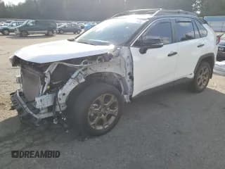 ✅ 2024 Toyota RAV4 Hybrid Woodland • VIN: 2T3UWRFV1RW210512 • Лот: 82576875. Опубликован ранее на Copart с пробегом 38 296 миль. Бесплатный доступ к архиву аукционных продаж из США и подробный отчёт об истории автомобиля на DreamBid. Изображение 1.