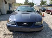 ✅ 2001 Ford Mustang Deluxe • VIN: 1FAFP44411F177879 • Lot: 67765685. Listed on Copart with 116,283 mi. Free auction sales archive from the USA and detailed vehicle history report at DreamBid. Image 5.