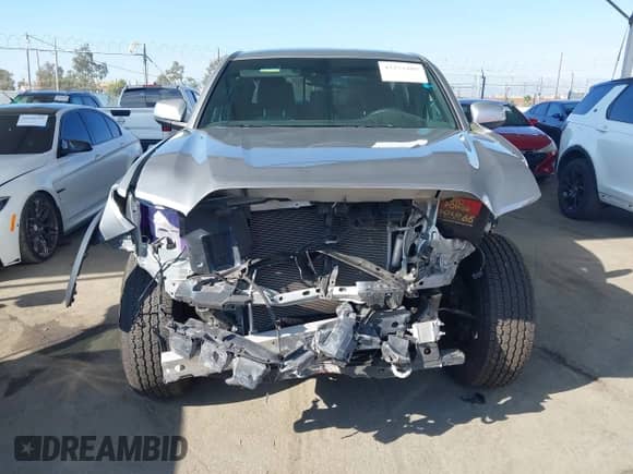 2022 Toyota Tacoma SR5 with VIN 3TMAZ5CN9NM186656, listed as a IAAI auction lot 43253480 with 25,540 mi miles and . Bid and sale history available at DreamBid. Image 18.
