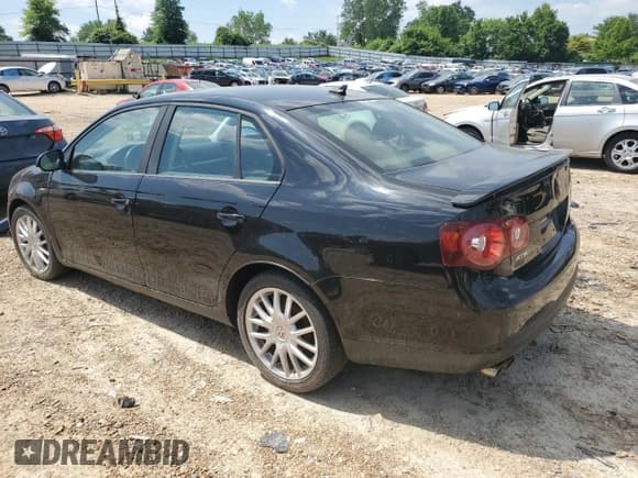 ✅ 2008 Volkswagen Jetta Wolfsburg Edition • VIN: 3VWRJ71K98M180176 • Lot: 55503854. Listed on Copart with 82,610 mi. Free auction sales archive from the USA and detailed vehicle history report at DreamBid. Image 2.