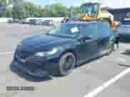 2019 Toyota Camry LE with VIN 4T1B11HK8KU256007, listed as a IAAI auction lot 42930126 with 107,264 mi miles and . Bid and sale history available at DreamBid. Image 16.