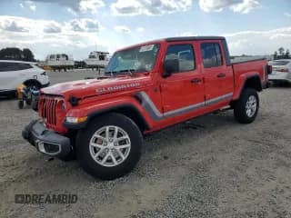 ✅ 2023 Jeep Gladiator Sport S • VIN: 1C6HJTAG1PL571476 • Lot: 81318065. Listed on Copart with 14,365 mi. Free auction sales archive from the USA and detailed vehicle history report at DreamBid. Image 1.