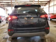 ✅ 2018 Hyundai Santa Fe 2.4L • VIN: 5XYZUDLB6JG528556 • Лот: 91180075. Опубликован ранее на Copart с пробегом 87 693 миль. Бесплатный доступ к архиву аукционных продаж из США и подробный отчёт об истории автомобиля на DreamBid. Изображение 6.