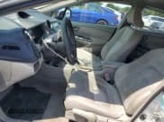 ✅ 2010 Honda Insight EX • VIN: JHMZE2H75AS003910 • Lot: 56485995. Listed on Copart with 104,685 mi. Free auction sales archive from the USA and detailed vehicle history report at DreamBid. Image 7.