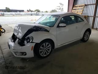 ✅ 2013 Volkswagen Beetle 2.0L TDI • VIN: 3VWJL7AT0DM686747 • Lot: 68773425. Listed on Copart with 95,825 mi. Free auction sales archive from the USA and detailed vehicle history report at DreamBid. Image 1.