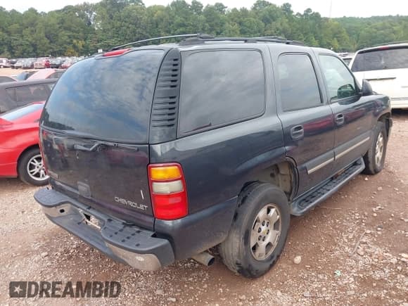 ✅ 2005 Chevrolet Tahoe LT • VIN: 1GNEK13T05J220212 • Lot: 43056980. Listed on IAAI with 169,213 mi. Free auction sales archive from the USA and detailed vehicle history report at DreamBid. Image 4.