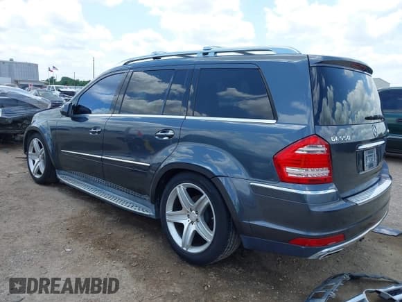 ✅ 2010 Mercedes-Benz GL 550 • VIN: 4JGBF8GE8AA573694 • Lot: 42193677. Listed on IAAI with 128,761 mi. Free auction sales archive from the USA and detailed vehicle history report at DreamBid. Image 3.