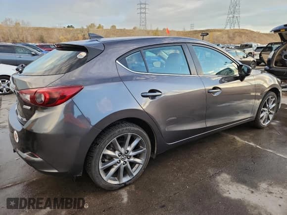 ✅ 2018 Mazda 3 Grand Touring • VIN: 3MZBN1M39JM265774 • Лот: 91309895. Опубликован ранее на Copart с пробегом 59 343 миль. Бесплатный доступ к архиву аукционных продаж из США и подробный отчёт об истории автомобиля на DreamBid. Изображение 3.