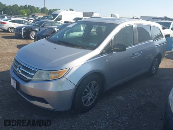 ✅ 2011 Honda Odyssey EX-L • VIN: 5FNRL5H6XBB057590 • Lot: 42481395. Listed on IAAI with 206,000 mi. Free auction sales archive from the USA and detailed vehicle history report at DreamBid. Image 2.