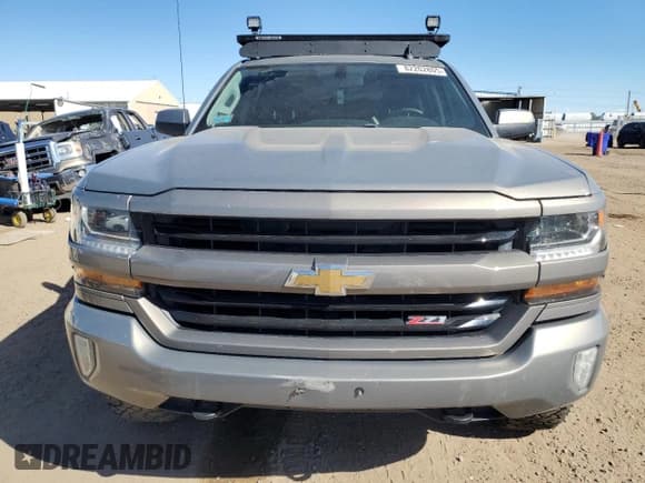 ✅ 2017 Chevrolet Silverado 1500 LT • VIN: 3GCUKRECXHG377395 • Lot: 82202805. Wystawiony na Copart z przebiegiem 150 910 mil. Bezpłatny archiwum sprzedaży aukcyjnych z USA i szczegółowy raport historii pojazdu na DreamBid. Zdjęcie 5.