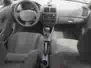 2004 Hyundai Accent GL с VIN KMHCG45C04U506196, выставлен на аукционе Copart как лот 51276195 с пробегом 75 550 миль миль и Чистый • Clean title. История ставок и продаж доступна на DreamBid. Изображение 8.