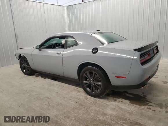 ✅ 2022 Dodge Challenger SXT • VIN: 2C3CDZGG0NH23099X • Lot: 84940714. Wystawiony na Copart z przebiegiem 56 676 mil. Bezpłatny archiwum sprzedaży aukcyjnych z USA i szczegółowy raport historii pojazdu na DreamBid. Zdjęcie 2.