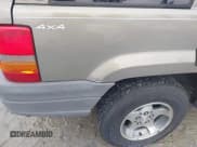 ✅ 1998 Jeep Grand Cherokee Laredo • VIN: 1J4GZ58S2WC249411 • Lot: 43873044. Listed on IAAI with 141,015 mi. Free auction sales archive from the USA and detailed vehicle history report at DreamBid. Image 6.