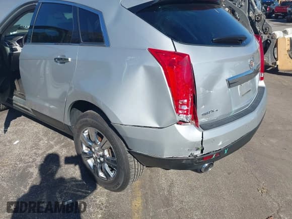 ✅ 2014 Cadillac SRX Luxury Collection • VIN: 3GYFNEE38ES532361 • Lot: 43530512. Listed on IAAI with 112,815 mi. Free auction sales archive from the USA and detailed vehicle history report at DreamBid. Image 6.