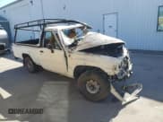 ✅ 1986 Toyota Pickup • VIN: JT4RN55E8G0213363 • Lot: 61797435. Listed on Copart with Not provided. Free auction sales archive from the USA and detailed vehicle history report at DreamBid. Image 4.
