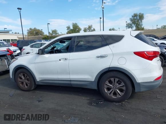 ✅ 2015 Hyundai Santa Fe • VIN: 5XYZTDLB9FG248463 • Лот: 43056598. Опубликован ранее на IAAI с пробегом 128 878 миль. Бесплатный доступ к архиву аукционных продаж из США и подробный отчёт об истории автомобиля на DreamBid. Изображение 14.