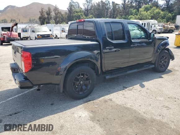 2021 Nissan Frontier SV with VIN 1N6ED0EB3MN702503, listed as a Copart auction lot 80188075 with 82,287 mi miles and Salvage title. Bid and sale history available at DreamBid. Image 3.