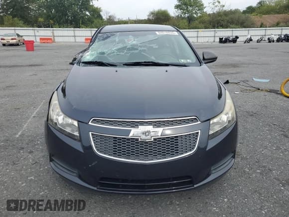 ✅ 2014 Chevrolet Cruze LS • VIN: 1G1PA5SG5E7110956 • Lot: 84618035. Listed on Copart with 57,193 mi. Free auction sales archive from the USA and detailed vehicle history report at DreamBid. Image 5.