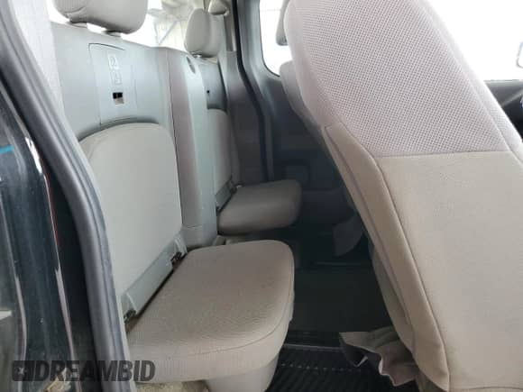 2015 Nissan Frontier S z VIN 1N6BD0CTXFN703634, wystawiony jako Copart lot #81787225 z przebiegiem 247 511 mil mil oraz Szkoda całkowita • Salvage title. Historia ofert i sprzedaży dostępna na DreamBid. Obrazek 10.