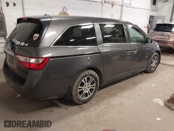 ✅ 2011 Honda Odyssey EX-L • VIN: 5FNRL5H67BB049446 • Lot: 42116436. Listed on IAAI with 197,667 mi. Free auction sales archive from the USA and detailed vehicle history report at DreamBid. Image 4.