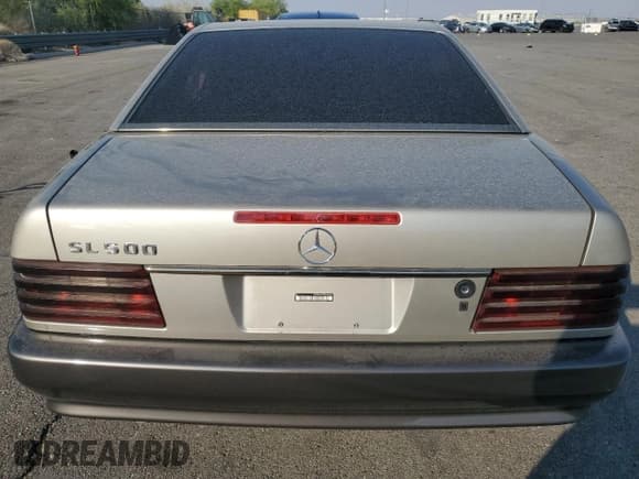 ✅ 1994 Mercedes-Benz SL 5.0L • VIN: WDBFA67E7RF085830 • Лот: 70479494. Опубликован ранее на Copart с пробегом 164 480 миль. Бесплатный доступ к архиву аукционных продаж из США и подробный отчёт об истории автомобиля на DreamBid. Изображение 6.