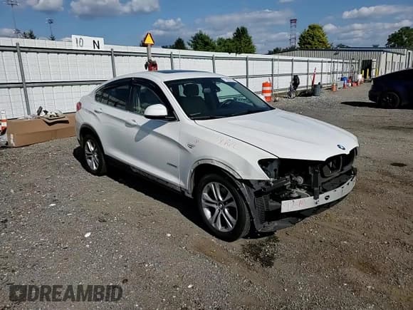 ✅ 2015 BMW X4 xDrive28i • VIN: 5UXXW3C51F0M88873 • Lot: 71823115. Listed on Copart with 124,869 mi. Free auction sales archive from the USA and detailed vehicle history report at DreamBid. Image 14.