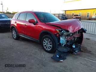 ✅ 2015 Mazda CX-5 Touring • VIN: JM3KE2CY1F0436301 • Lot: 43603235. Listed on IAAI with Not provided. Free auction sales archive from the USA and detailed vehicle history report at DreamBid. Image 1.