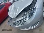 ✅ 2015 Lincoln MKZ • VIN: 3LN6L2G95FR615925 • Lot: 42344017. Wystawiony na IAAI z przebiegiem 162 912 mil. Bezpłatny archiwum sprzedaży aukcyjnych z USA i szczegółowy raport historii pojazdu na DreamBid. Zdjęcie 12.