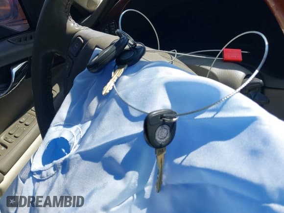 ✅ 2001 Cadillac DeVille DTS • VIN: 1G6KF57931U282835 • Lot: 41780555. Listed on IAAI with Not provided. Free auction sales archive from the USA and detailed vehicle history report at DreamBid. Image 11.