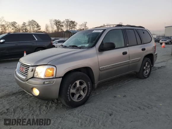 ✅ 2003 GMC Envoy SLE • VIN: 1GKDS13S432117737 • Lot: 92856475. Wystawiony na Copart z przebiegiem Nie podano. Bezpłatny archiwum sprzedaży aukcyjnych z USA i szczegółowy raport historii pojazdu na DreamBid. Zdjęcie 1.