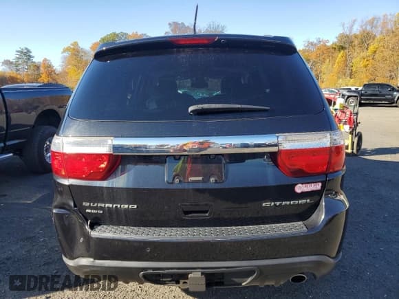 ✅ 2013 Dodge Durango Citadel • VIN: 1C4RDJEG1DC677649 • Lot: 89494135. Wystawiony na Copart z przebiegiem 158 796 mil. Bezpłatny archiwum sprzedaży aukcyjnych z USA i szczegółowy raport historii pojazdu na DreamBid. Zdjęcie 6.