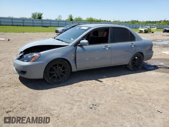 ✅ 2005 Mitsubishi Lancer ES • VIN: JA3AJ26E65U054420 • Lot: 52206935. Listed on Copart with 187,277 mi. Free auction sales archive from the USA and detailed vehicle history report at DreamBid. Image 1.
