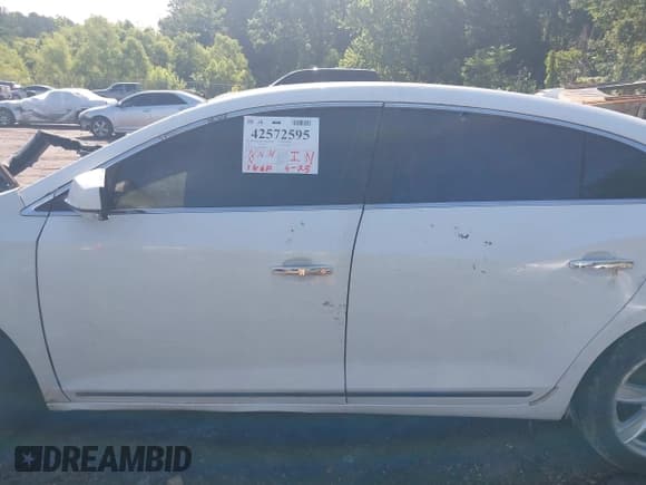 ✅ 2013 Buick LaCrosse Leather • VIN: 1G4GC5E34DF206376 • Lot: 42572595. Listed on IAAI with Not provided. Free auction sales archive from the USA and detailed vehicle history report at DreamBid. Image 14.