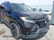 ✅ 2020 Honda Passport Elite • VIN: 5FNYF8H00LB003152 • Lot: 43236775. Listed on IAAI with 63,303 mi. Free auction sales archive from the USA and detailed vehicle history report at DreamBid. Image 6.