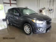 ✅ 2015 Mazda CX-5 Touring • VIN: JM3KE2CY6F0506259 • Lot: 69928775. Listed on Copart with 140,555 mi. Free auction sales archive from the USA and detailed vehicle history report at DreamBid. Image 4.