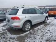 ✅ 2014 Volkswagen Touareg Sport • VIN: WVGEF9BP6ED006075 • Lot: 41478721. Wystawiony na IAAI z przebiegiem 129 150 mil. Bezpłatny archiwum sprzedaży aukcyjnych z USA i szczegółowy raport historii pojazdu na DreamBid. Zdjęcie 4.