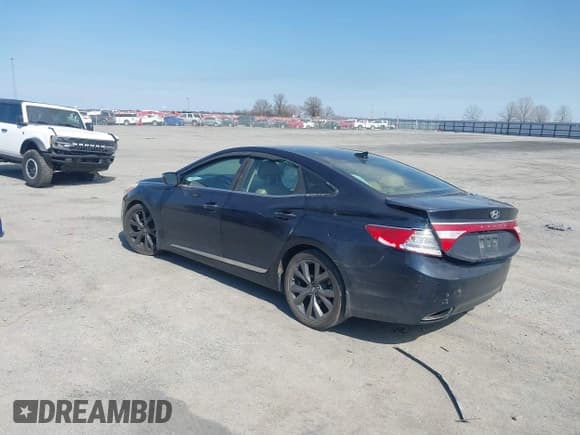 ✅ 2013 Hyundai Azera • VIN: KMHFH4JG6DA233205 • Лот: 41643389. Опубликован ранее на IAAI с пробегом 200 842 миль. Бесплатный доступ к архиву аукционных продаж из США и подробный отчёт об истории автомобиля на DreamBid. Изображение 3.