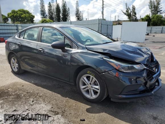 ✅ 2018 Chevrolet Cruze LT • VIN: 1G1BE5SM9J7151525 • Lot: 57808323. Listed on Copart with 101,077 mi. Free auction sales archive from the USA and detailed vehicle history report at DreamBid. Image 4.