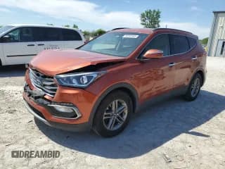 ✅ 2018 Hyundai Santa Fe 2.4L • VIN: 5XYZUDLB4JG520665 • Лот: 56243165. Опубликован ранее на Copart с пробегом 102 252 миль. Бесплатный доступ к архиву аукционных продаж из США и подробный отчёт об истории автомобиля на DreamBid. Изображение 1.