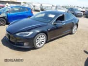 ✅ 2016 Tesla Model S 90D • VIN: 5YJSA1E21GF177111 • Lot: 40026667. Listed on IAAI with 92,097 mi. Free auction sales archive from the USA and detailed vehicle history report at DreamBid. Image 2.
