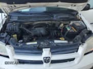 ✅ 2010 Dodge Grand Caravan Cargo • VIN: 2D4CN1AEXAR354388 • Lot: 71770624. Listed on Copart with 230,644 mi. Free auction sales archive from the USA and detailed vehicle history report at DreamBid. Image 14.