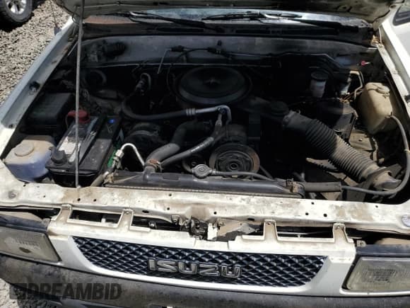 ✅ 1992 Isuzu Rodeo • VIN: 4S2CY58Z4N4308640 • Lot: 70823954. Wystawiony na Copart z przebiegiem 227 927 mil. Bezpłatny archiwum sprzedaży aukcyjnych z USA i szczegółowy raport historii pojazdu na DreamBid. Zdjęcie 12.