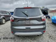 ✅ 2017 Ford Escape Titanium • VIN: 1FMCU0JDXHUD16122 • Lot: 95988025. Wystawiony na Copart z przebiegiem 63 513 mil. Bezpłatny archiwum sprzedaży aukcyjnych z USA i szczegółowy raport historii pojazdu na DreamBid. Zdjęcie 6.