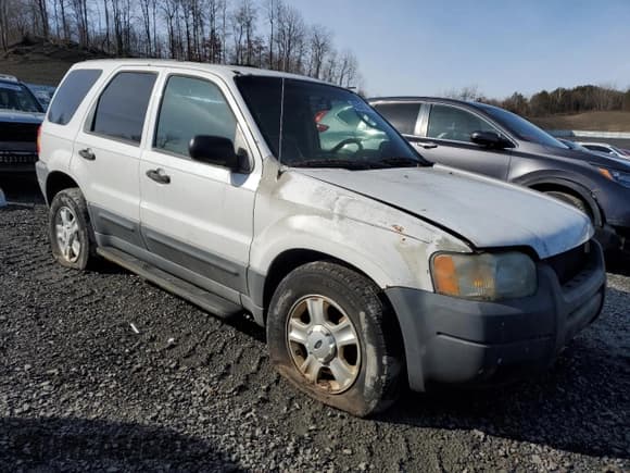 ✅ 2003 Ford Escape XLT Popular • VIN: 1FMYU03153KC15034 • Lot: 58889875. Listed on Copart with 190,986 mi. Free auction sales archive from the USA and detailed vehicle history report at DreamBid. Image 4.
