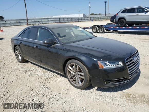 ✅ 2015 Audi A8 4.0T • VIN: WAU32AFD1FN007541 • Лот: 81677215. Опубликован ранее на Copart с пробегом 133 564 миль. Бесплатный доступ к архиву аукционных продаж из США и подробный отчёт об истории автомобиля на DreamBid. Изображение 4.