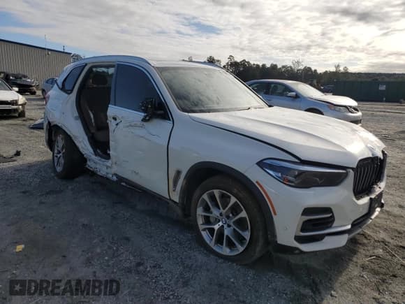 ✅ 2022 BMW X5 xDrive40i • VIN: 5UXCR6C04N9M31119 • Lot: 85009615. Listed on Copart with 24,621 mi. Free auction sales archive from the USA and detailed vehicle history report at DreamBid. Image 4.